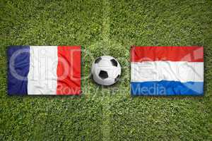 France vs. Netherlands flags on soccer field