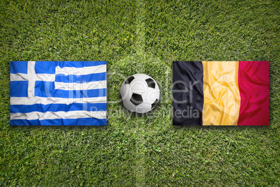 Greece vs. Belgium flags on soccer field