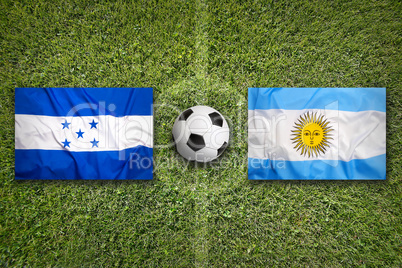 Honduras vs. Argentina flags on soccer field