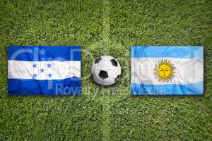 Honduras vs. Argentina flags on soccer field