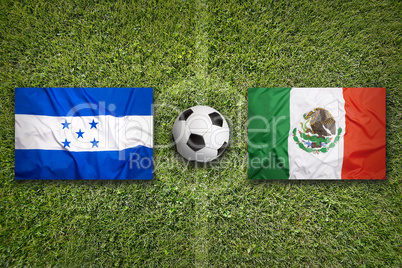 Honduras vs. Mexico flags on soccer field
