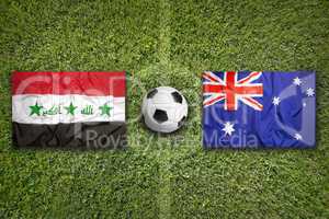 Iraq vs. Australia flags on soccer field