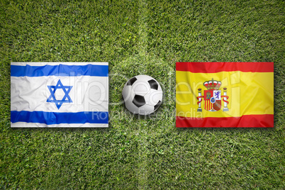 Israel vs. Spain flags on soccer field