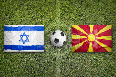 Israel vs. Macedonia flags on soccer field