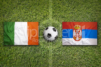 Ireland vs. Serbia flags on soccer field