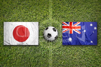 Japan vs. Australia flags on soccer field