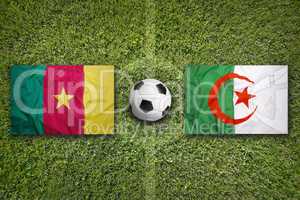 Cameroon vs. Algeria flags on soccer field