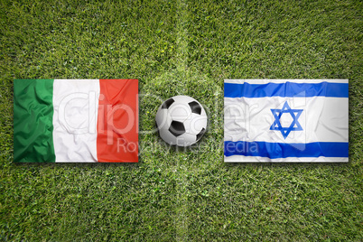 Italy vs. Israel flags on soccer field