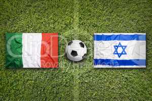 Italy vs. Israel flags on soccer field
