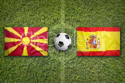 Macedonia vs. Spain flags on soccer field