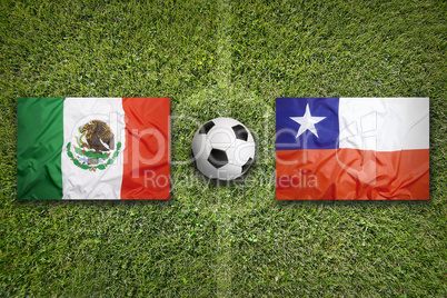 Mexico vs. Chile flags on soccer field