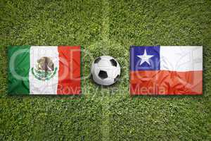 Mexico vs. Chile flags on soccer field