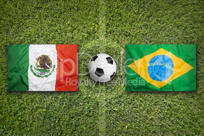 Mexico vs. Brazil flags on soccer field