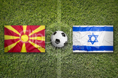 Macedonia vs. Israel flags on soccer field