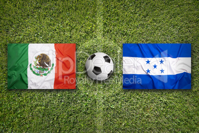 Mexico vs. Honduras flags on soccer field