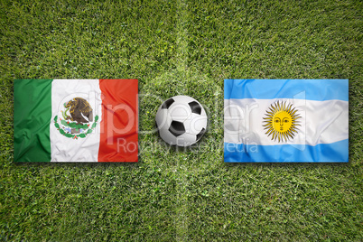 Mexico vs. Argentina flags on soccer field