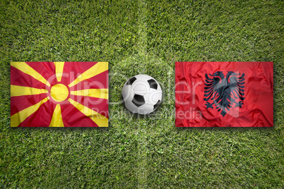 Macedonia vs. Albania flags on soccer field