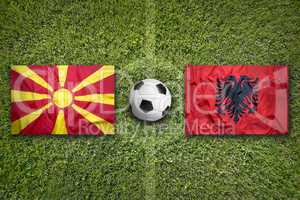 Macedonia vs. Albania flags on soccer field