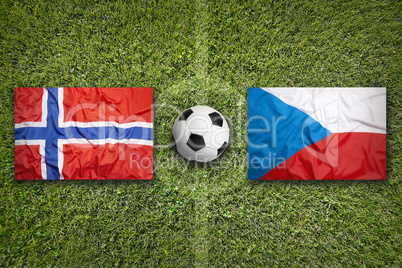 Norway vs. Czech Republic flags on soccer field
