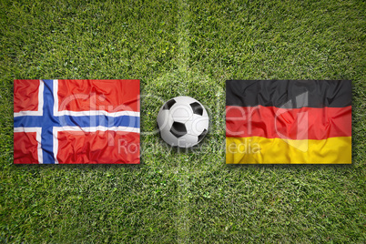 Norway vs. Germany flags on soccer field