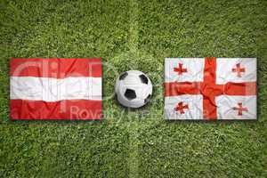 Austria vs. Georgia flags on soccer field