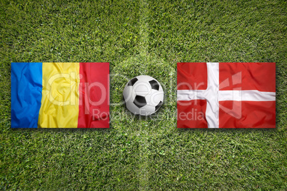 Romania vs. Denmark flags on soccer field