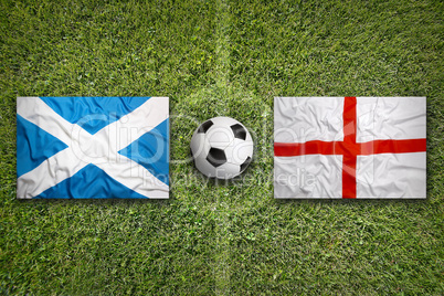 Scotland vs. England flags on soccer field