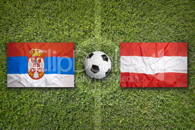 Serbia vs. Austria flags on soccer field