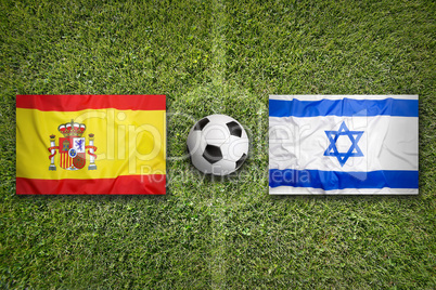 Spain vs. Israel flags on soccer field