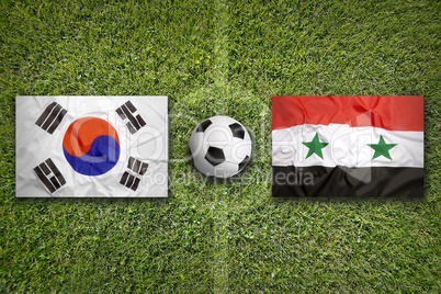 South Korea vs. Syria flags on soccer field