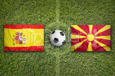 Spain vs. Macedonia flags on soccer field