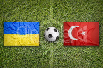 Ukraine vs. Turkey flags on soccer field