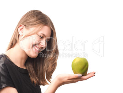 Young happy woman with a green apple