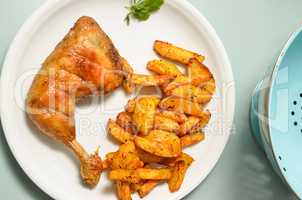 Roasted chicken with potato wedges