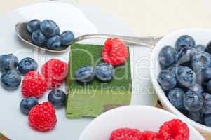 green tea matcha mousse cake with berries
