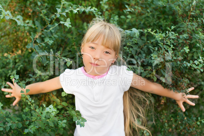 Portrait of a girl on the nature