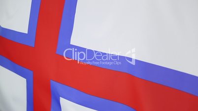 Closeup of Faeroe Islands flag in slow motion