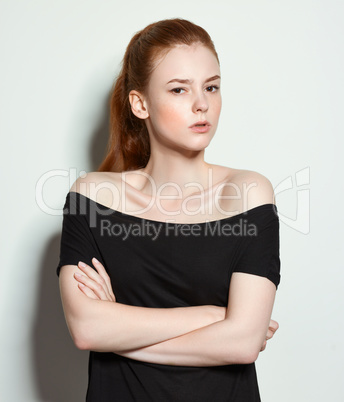 Emotional beauty portraits red-haired girl.