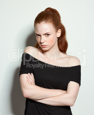 Emotional beauty portraits red-haired girl.
