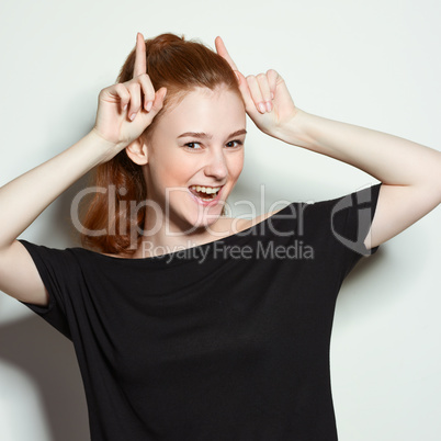 Emotional beauty portraits red-haired girl.