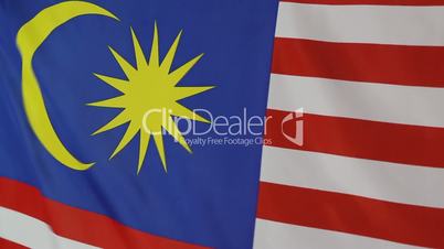 Closeup of a textile flag of Malaysia in slow motion