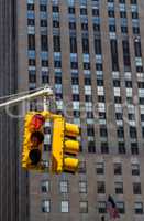 yellow traffic light on the background of skyscrapers in NY