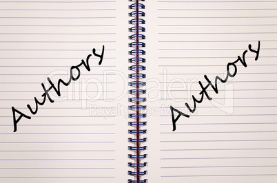 Authors write on notebook