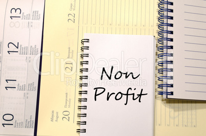 Non profit write on notebook