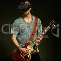 Guitarist plays in a virtual reality glasses.
