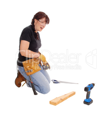 Woman working with tools.