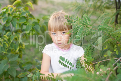 Portrait of a girl on the nature