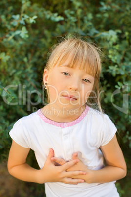 Portrait of a girl on the nature