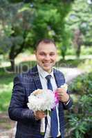 Funny bride with bouquet in hands