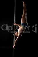 Pole dance. Photo of strong guy posing at camera